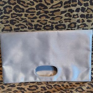 Silver metallic fold-over handle satiny clutch NM